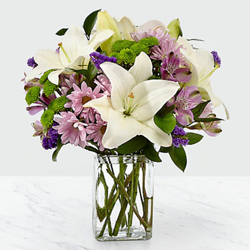 Pink, Purple & Green Flowers in a Low Vase